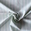 Detalje af poplin vævning med grønne striber