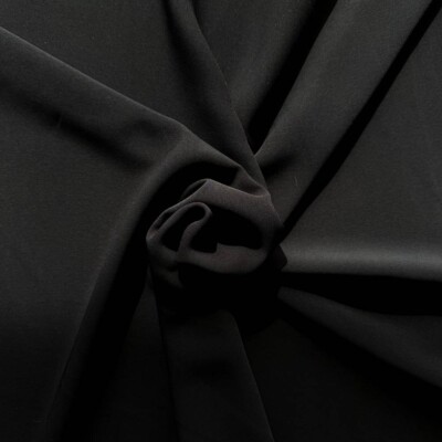 Sort foerstof i 100% polyester - detalje