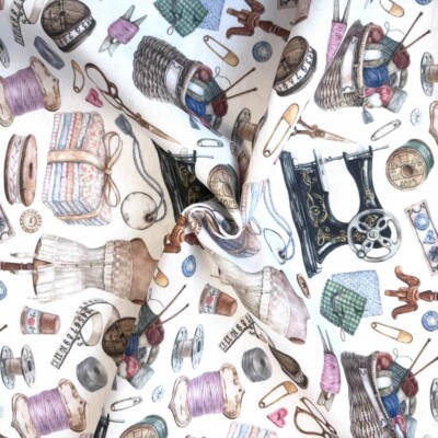 Detail of sewing-themed print on woven canvas