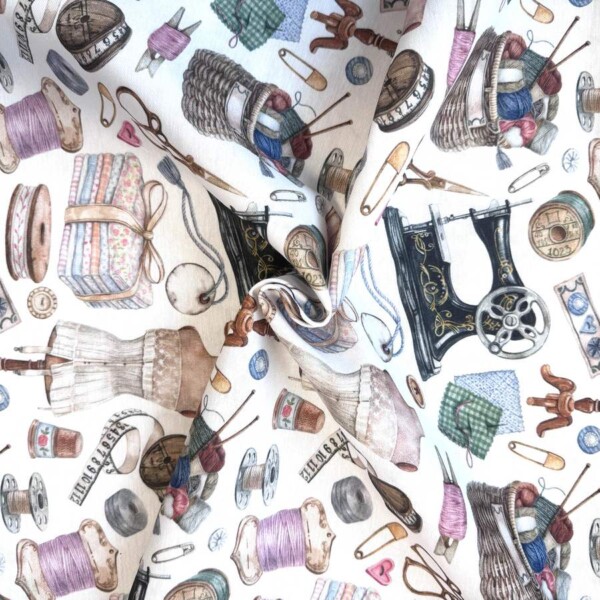 Detail of sewing-themed print on woven canvas