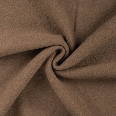 Boiled wool bouclé in army green 100% wool fabric