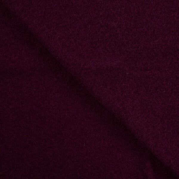 Yksityiskohta violetista villaa olevasta bouclé-rakenteesta