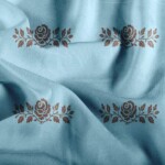 Viscose med roser - himmelblå/pecan