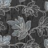 Nærbillede af blad broderi på sort vævet denim