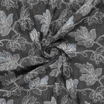 Black denim kirjailtulla lehtikuviolla, 135 cm leveä