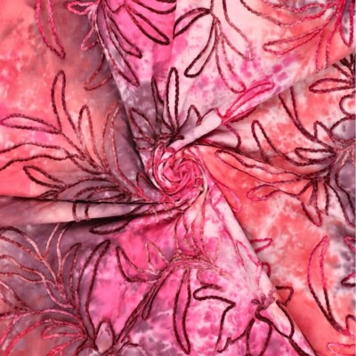 Broderie anglaise fabric by the metre, pink tie-dye from Jydsk Stoflager