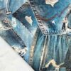 Bomuld twill med denim lomme print som metervare på rulle