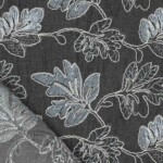 Black lehtikirjailtu denim rullalla