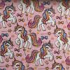 Printed jersey fabric with unicorns and crowns - light pink