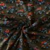 Detalje af monstertruck-print på brushed french terry