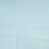 Sandwashed cotton in dusty mint, woven canvas 170 g/m²
