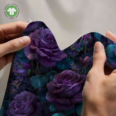 Detail of lilac roses on petrol digital print jersey fabric