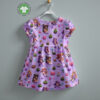 Digital print cotton jersey with pixel girls on lavender checked base