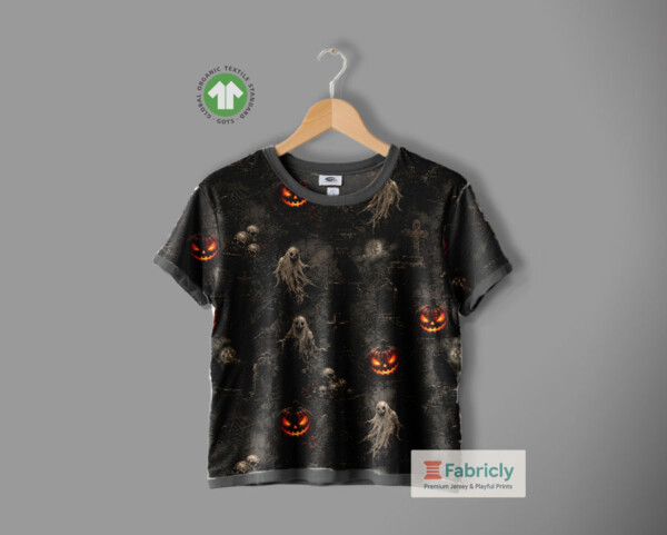 Detalje af Halloween jersey print med ugler og græskar