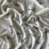 Sileä single jersey -rakenne merinovilla-silkissä lentokonekuosilla