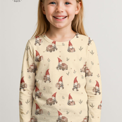 Detail of gnomes and gift cart motif on cream cotton jersey