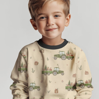 Repeat view of tractors and Christmas trees print on cream jersey fabric