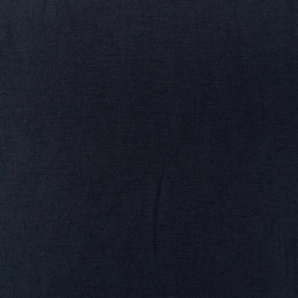 Close-up of dark navy merino wool single jersey knit