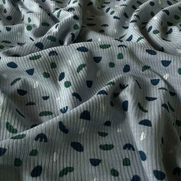 Close-up of 2/1 rib structure in merino wool/silk jersey with print