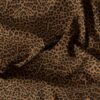 Brun leopard denimstof med stræk tæt på