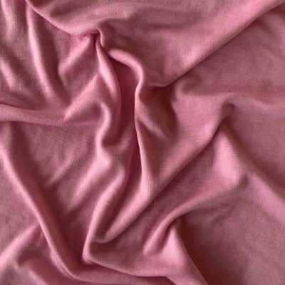 Rosa merinould jersey 200 g/m² glat overflade nærbillede