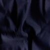 Detalje af marineblå denim med stræk