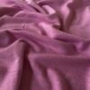Overflade og struktur på merinould jersey i pink melange