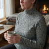 Overflade og struktur på merinould/silke ribstrik med grafisk print