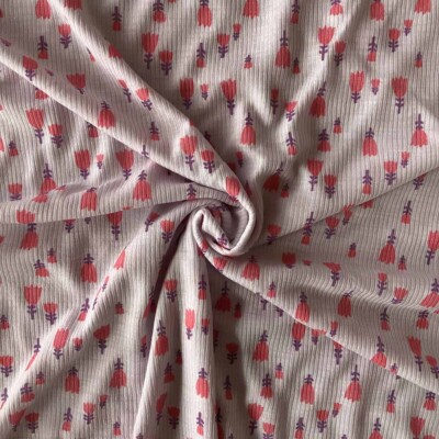 Detalje af tulipanprint på merinould/silke ribstrik 200 g/m²