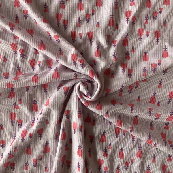 Detalje af tulipanprint på merinould/silke ribstrik 200 g/m²