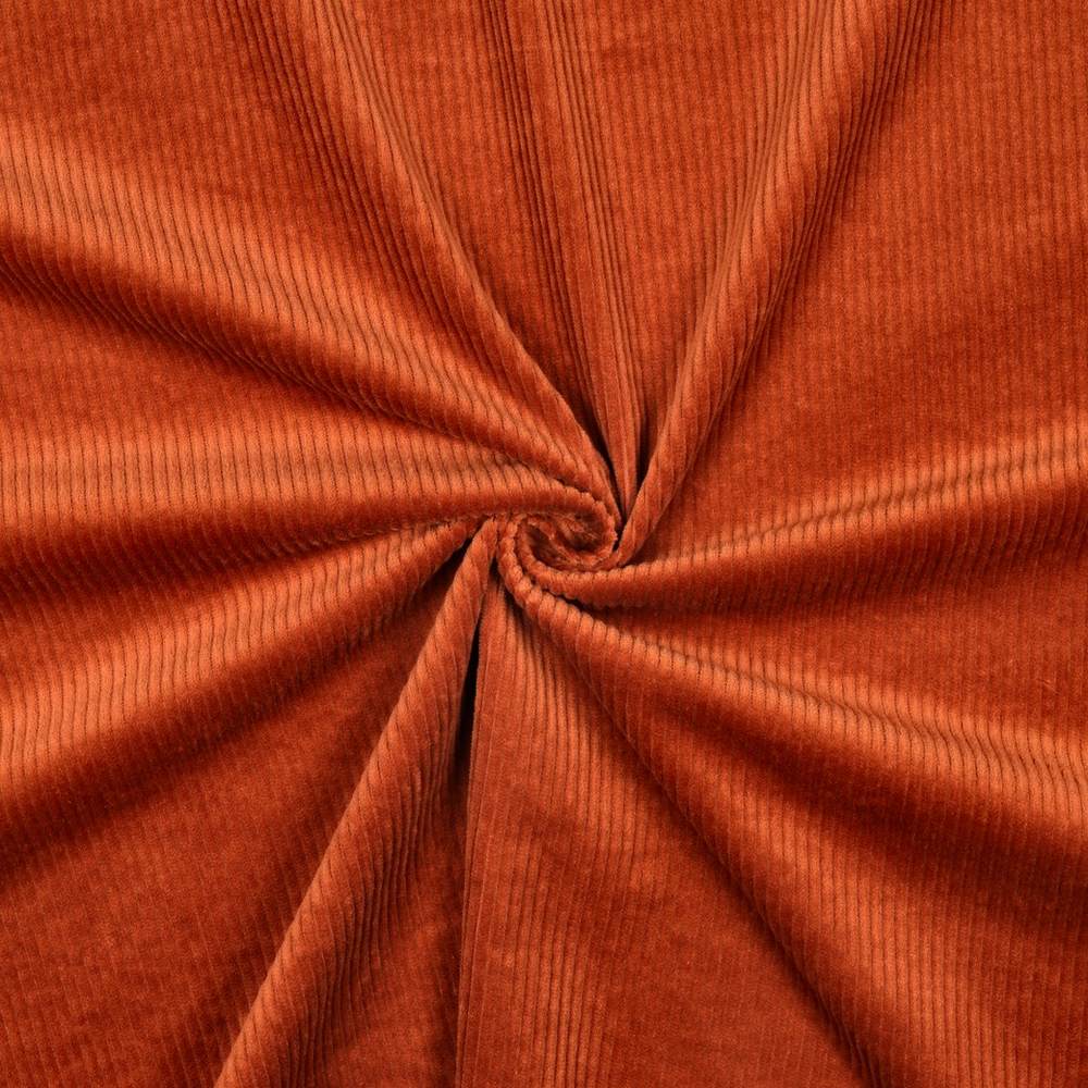 Surface texture of wide-wale stretch corduroy, terracotta