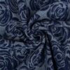 Close-up of rose motif in navy denim jacquard, 150 cm wide