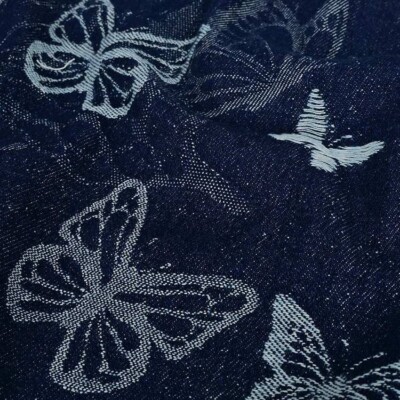 Detail of navy denim jacquard with woven structure