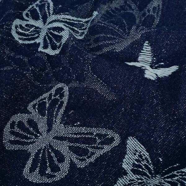 Detail of navy denim jacquard with woven structure