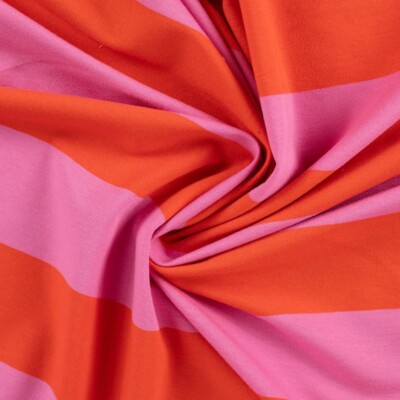 Close-up of french terry knit with orange and light pink stripes