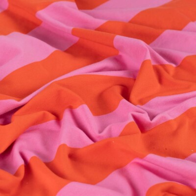Loop back interior of french terry fabric with orange and light pink stripes
