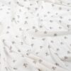 Rib jersey yardage with elephants on ecru, 135 cm wide