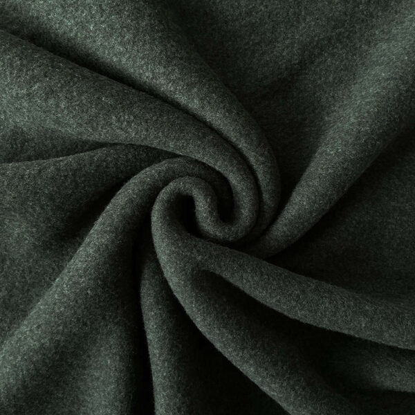 Mørkegrøn merinould fleece, snoet i en spiral, så faldet ses