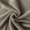 Lys Taupe merinould fleece, snoet i en spiral, så faldet ses