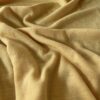 Curry Yellow merino wool jersey, close-up of the rib knit structure
