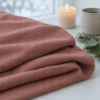 Terracotta merinould jersey, foldet ved levende lys