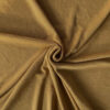 Ochre merino wool jersey, twisted into a spiral to show drape