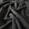Asphalt merino wool jersey close-up of the rib knit texture