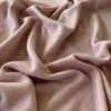 Antique rose merino wool jersey, close-up of the rib knit texture