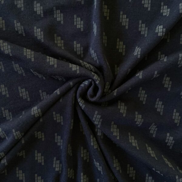 Navy Blue Mosaic merino wool jersey, twisted into a spiral to show the drape