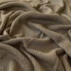 Sand merino wool jersey, close-up of the rib knit texture