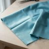 Anorakstof i aqua, twill i polyester og bomuld
