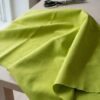 Anorakstof i limegrøn, twill i polyester og bomuld