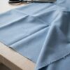 Anorakstof i lyseblå, twill i polyester og bomuld
