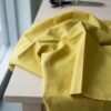 Anorakstof i sennep, twill i polyester og bomuld
